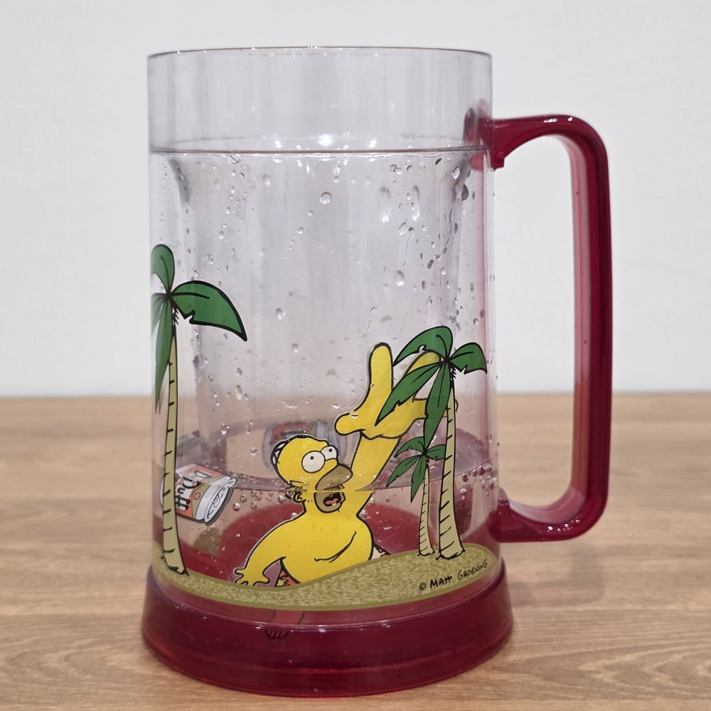  "The Simpsons" freezer mug featuring Homer Simpson and a Duff Beer cans. 